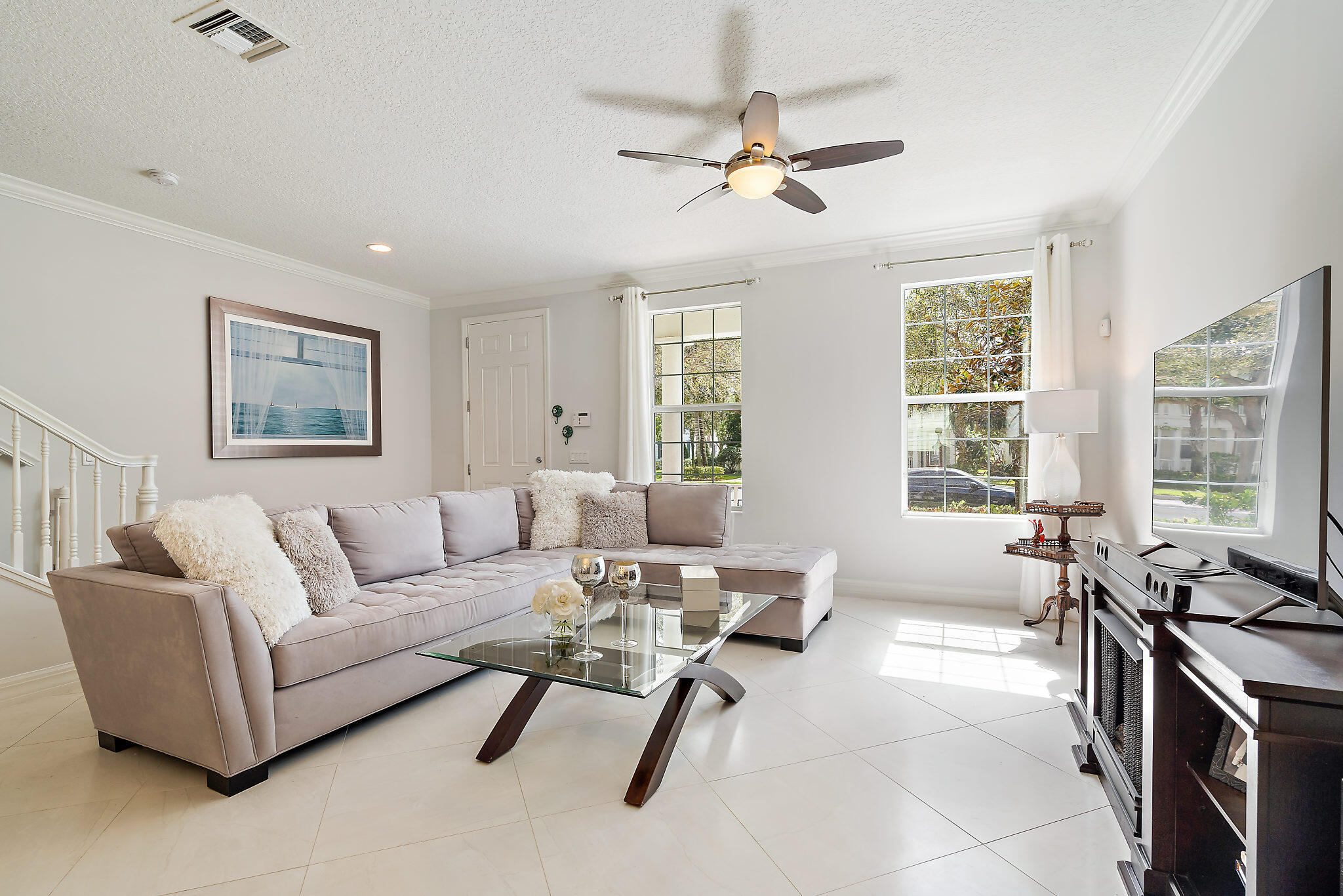 1237 Dakota Drive Jupiter, FL 33458 - Photo 7 of 32 a living room with furniture and windows