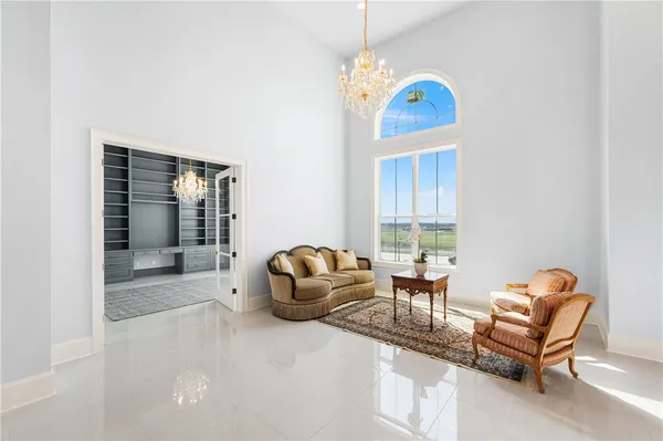 a view of living room with furniture and fireplace