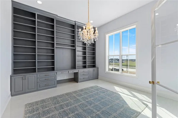 a bedroom with a bed and a fireplace