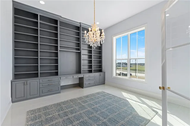 a bedroom with a bed and a fireplace