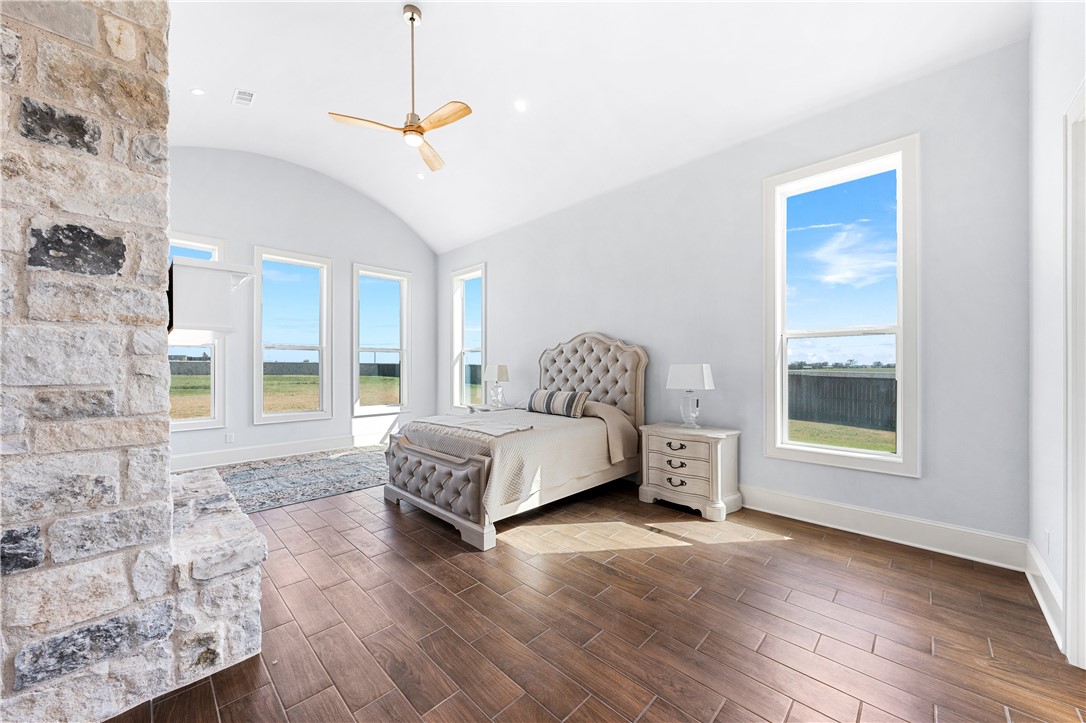 112 Yellow Rose Street Lorena, TX 76655 - Photo 20 of 42 a spacious bedroom with a large bed and a window