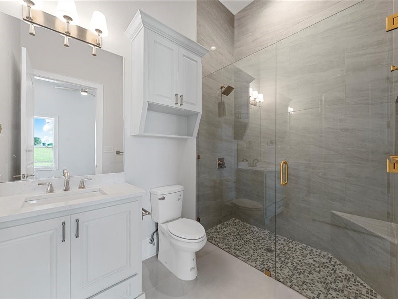 112 Yellow Rose Street Lorena, TX 76655 - Photo 28 of 42 a bathroom with a sink a toilet and shower
