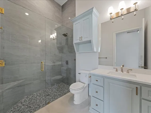 a bed room with a bed and a window