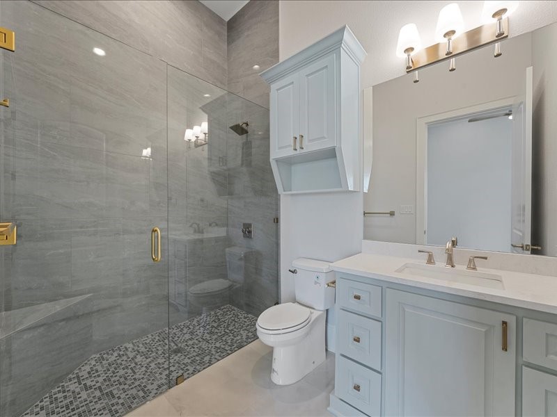112 Yellow Rose Street Lorena, TX 76655 - Photo 31 of 42 a bathroom with a sink a toilet and shower