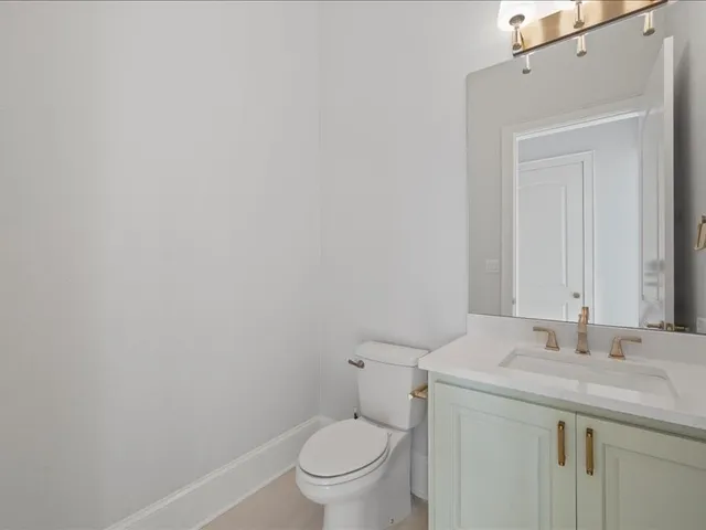 a view of an empty room with windows