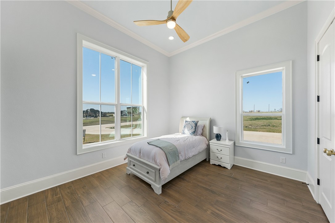 112 Yellow Rose Street Lorena, TX 76655 - Photo 34 of 42 a bed room with a bed and a window