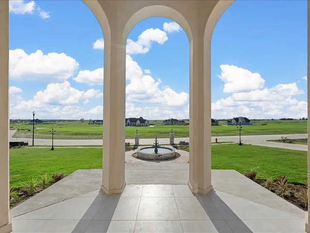 a view of a garden with patio