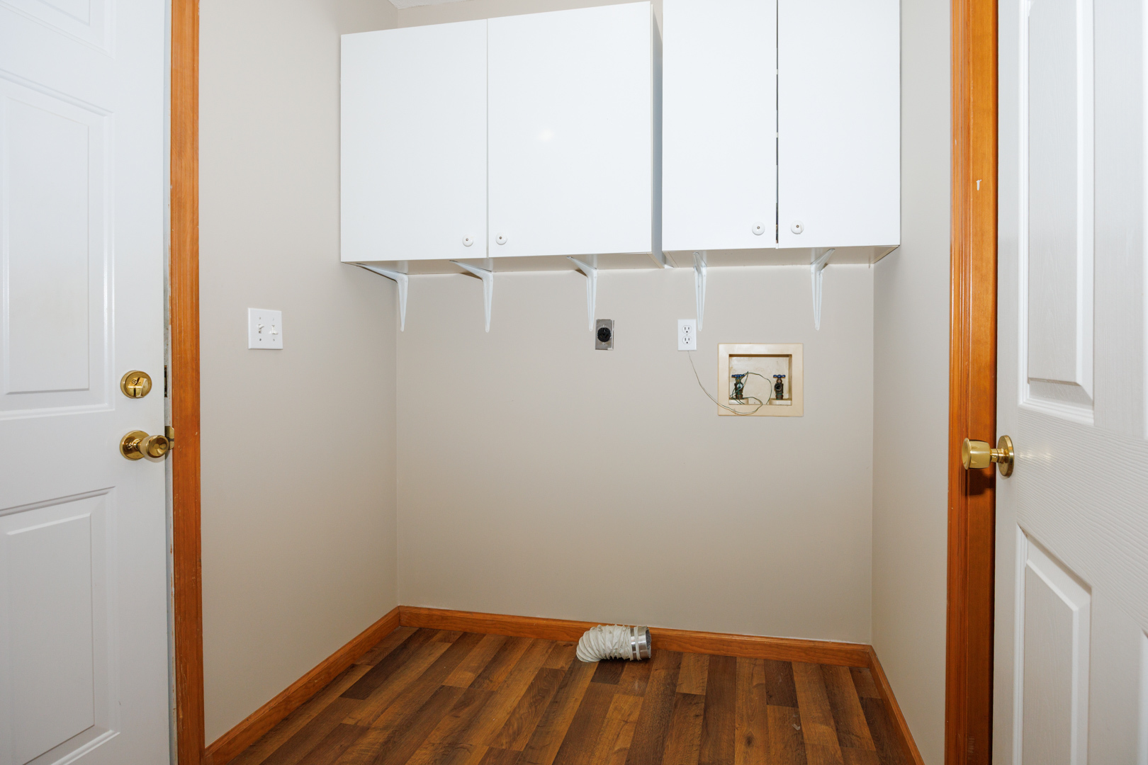 1414 B Tamarack Country Club Trail Normal, IL 61761 - Photo 16 of 48 a view of walk in closet with empty racks