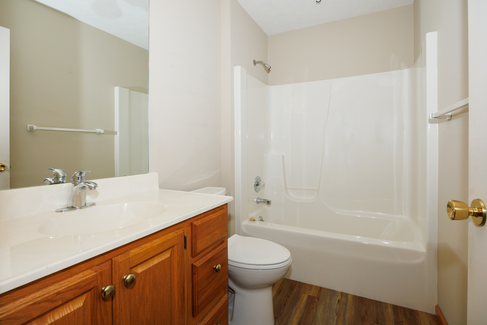 1414 B Tamarack Country Club Trail Normal, IL 61761 - Photo 17 of 48 a bathroom with a sink a toilet and shower