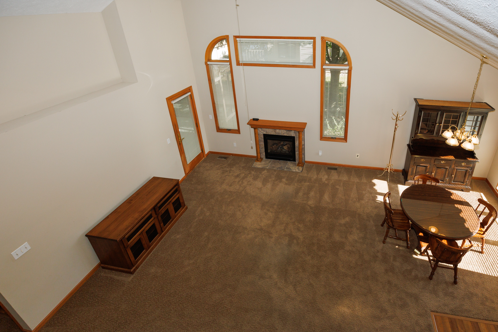 1414 B Tamarack Country Club Trail Normal, IL 61761 - Photo 26 of 48 a room with a chair and a mirror