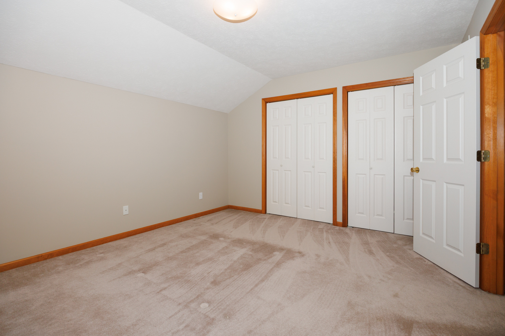 1414 B Tamarack Country Club Trail Normal, IL 61761 - Photo 30 of 48 a view of an empty room with a window