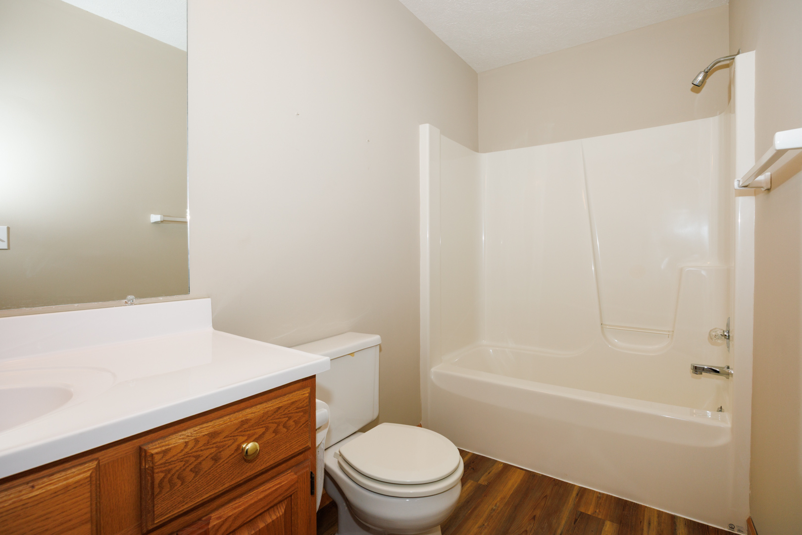 1414 B Tamarack Country Club Trail Normal, IL 61761 - Photo 32 of 48 a bathroom with a sink a toilet and shower