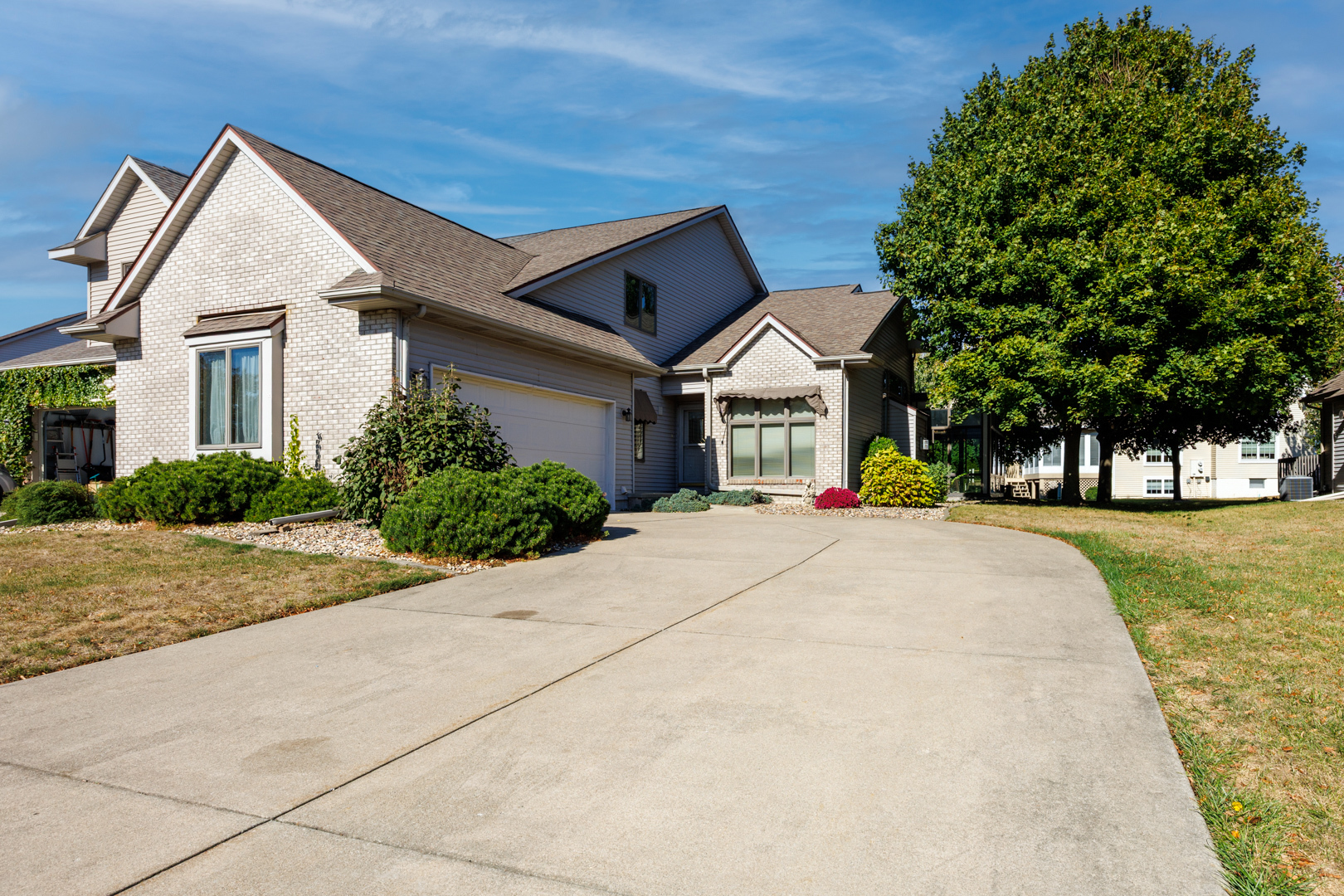 1414 B Tamarack Country Club Trail Normal, IL 61761 - Photo 39 of 48 a view of outdoor space yard and front view of a house
