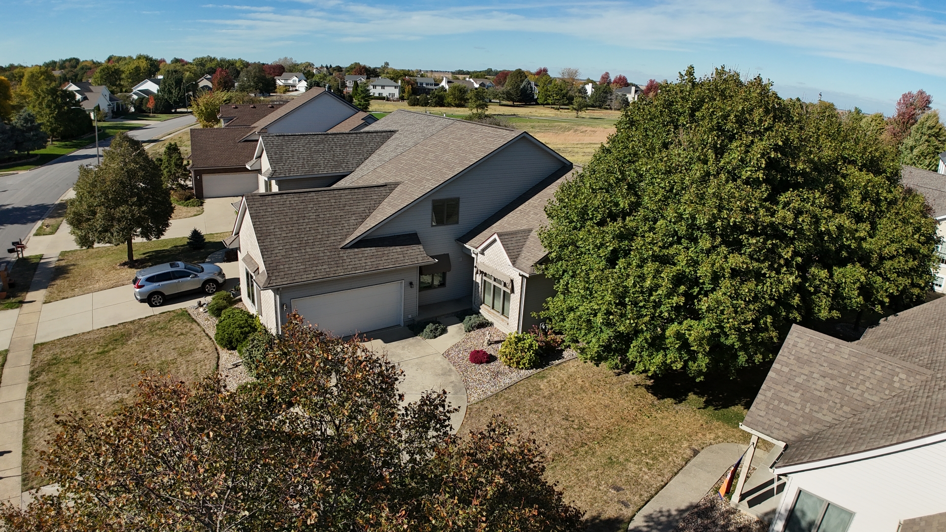 1414 B Tamarack Country Club Trail Normal, IL 61761 - Photo 47 of 48 an aerial view of a house with a yard