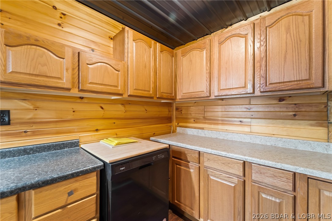 Pantry behind stove in kitchen.