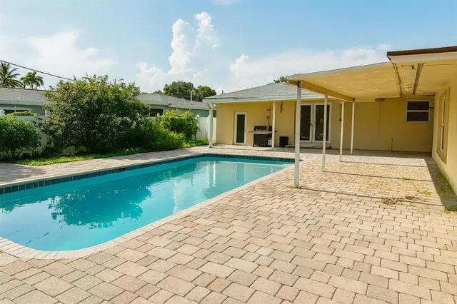 swimming pool with lounge chair