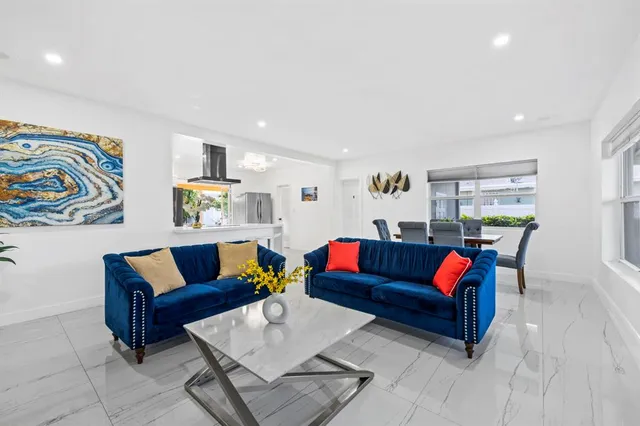 a living room with furniture and a couch