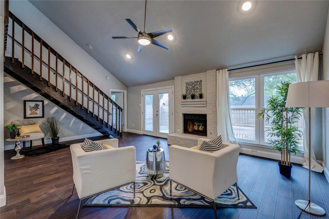 7806 Finch Trail Austin, TX 78745 - Photo 1 of 1 a living room with furniture fireplace and flat screen tv