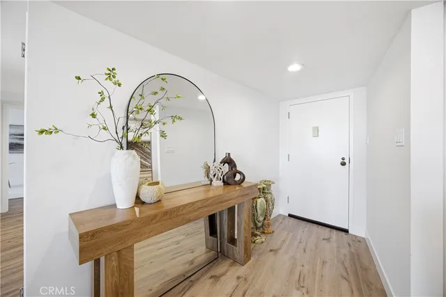 a view of a hallway with entryway
