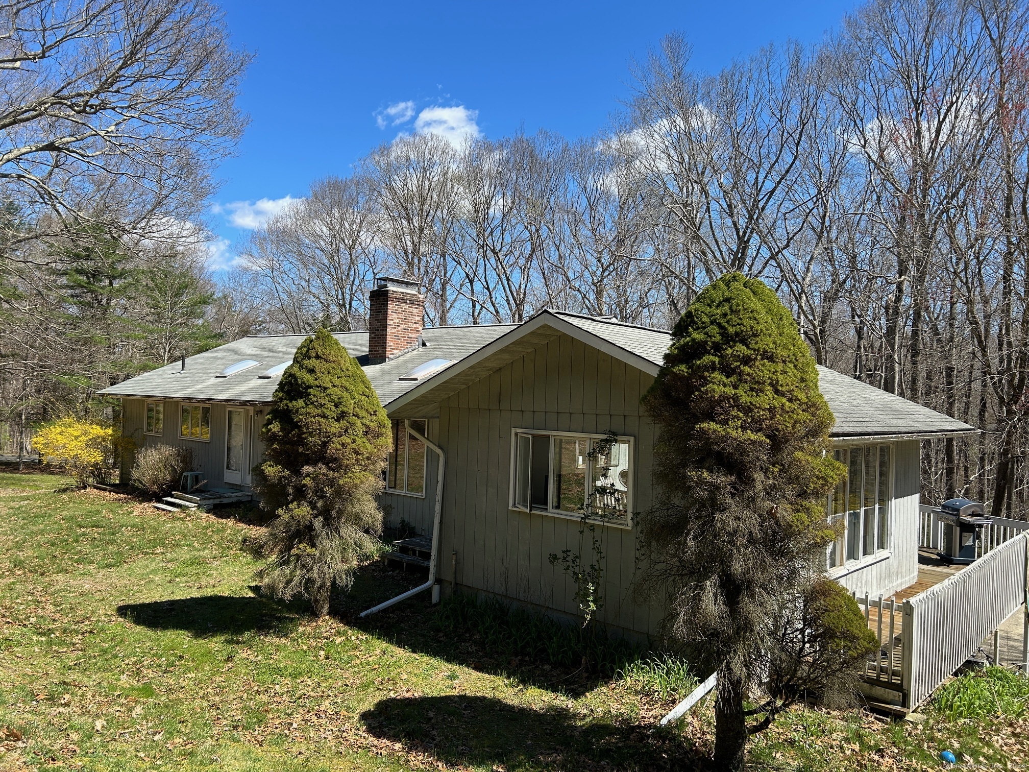 307 Summer Hill Road Madison, CT 06443 - Photo 1 of 1 View of front and side of house. All rooms are above grade and most with sliding glass doors.
