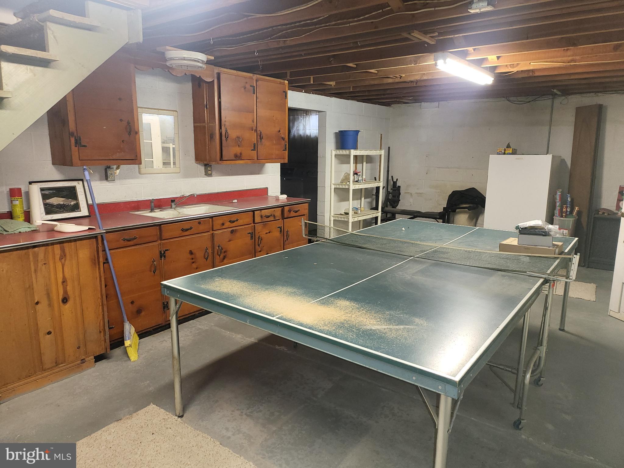 161 Oakhill Road Carlisle, PA 17015 - Photo 25 of 25 a kitchen with kitchen island a stove and a refrigerator