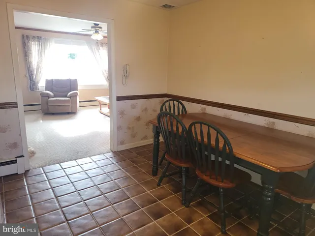 a view of entryway with livingroom