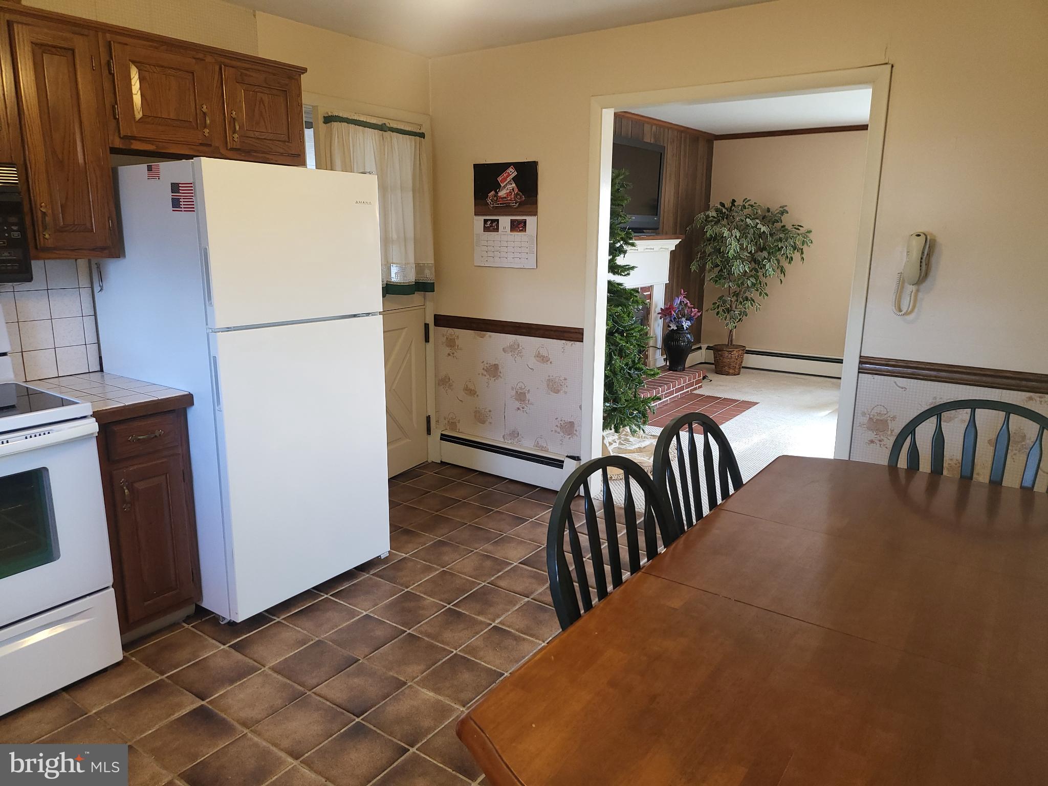 161 Oakhill Road Carlisle, PA 17015 - Photo 6 of 25 a view of kitchen with furniture and refrigerator