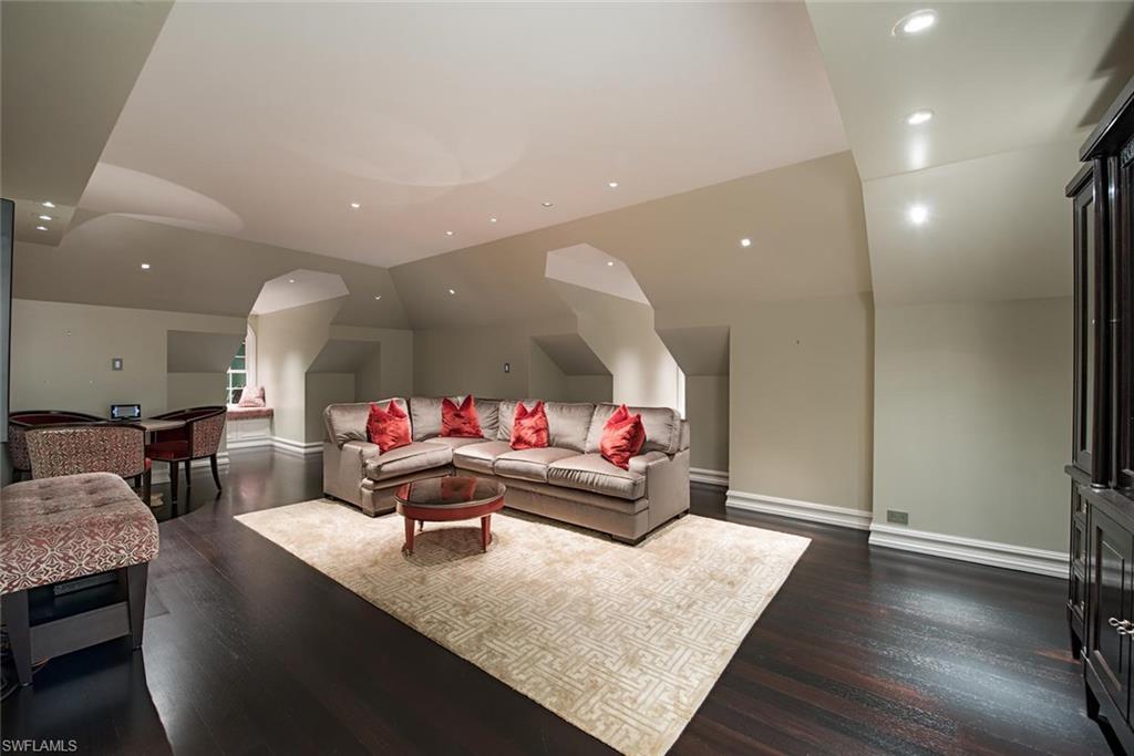 2500 Gordon Drive Naples, FL 34102 - Photo 11 of 25 a living room with furniture and a wooden floor