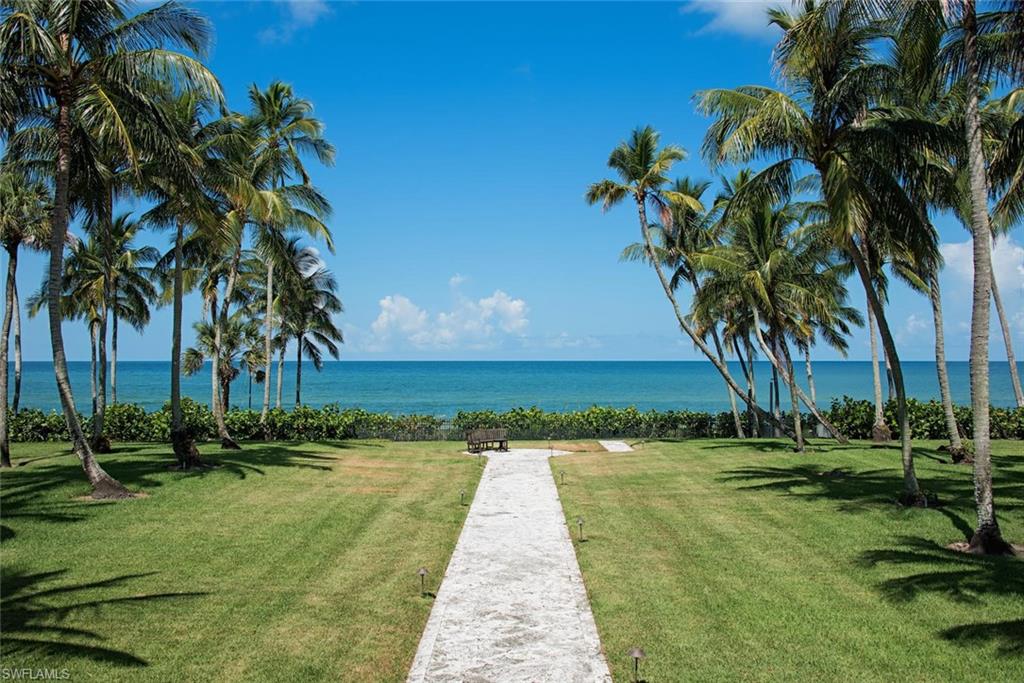 2500 Gordon Drive Naples, FL 34102 - Photo 5 of 25 a view of a yard with palm trees