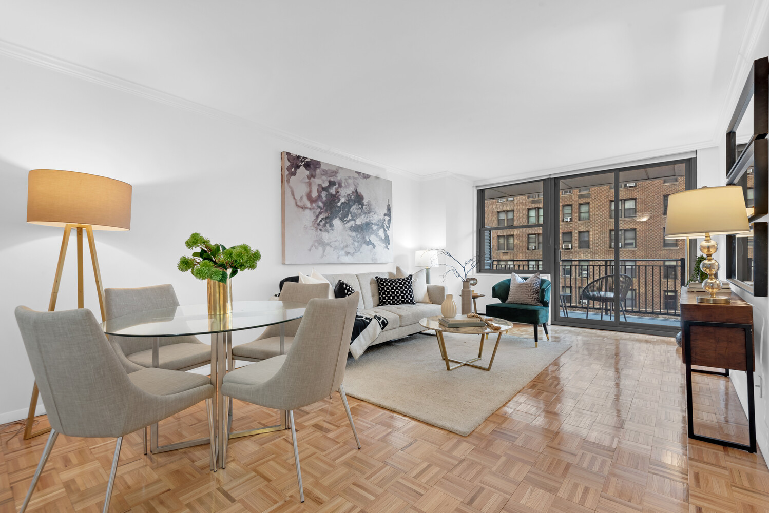 a living room with furniture and a lamp