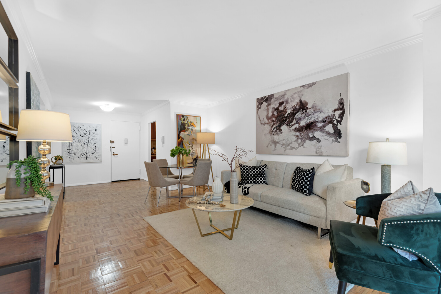 301 East 79th Street, Unit 5P Manhattan, NY 10075 - Photo 4 of 16 a living room with furniture and a lamp