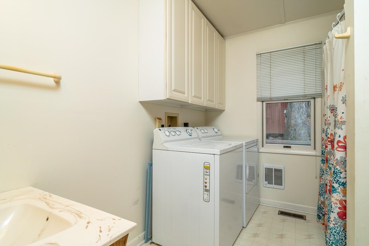 188 New Market Reservoir Road New Market, VA 22844 - Photo 15 of 61 a utility room with dryer and washer