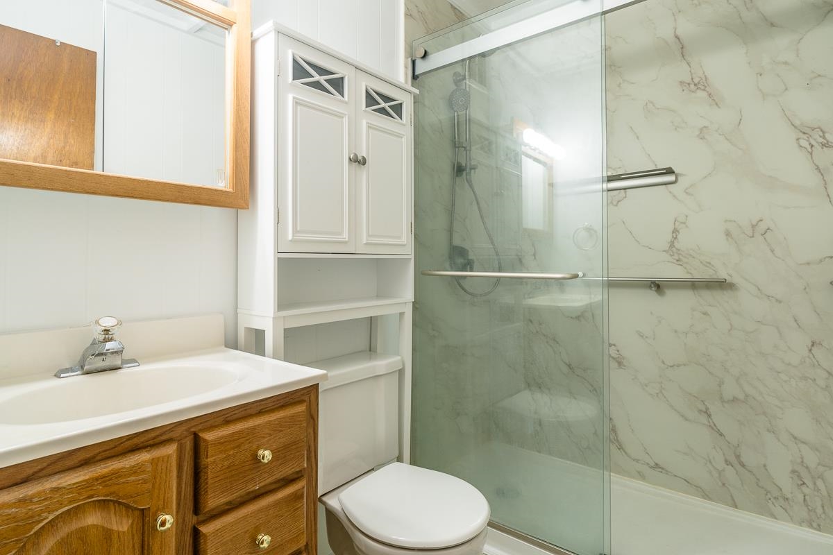 188 New Market Reservoir Road New Market, VA 22844 - Photo 20 of 61 a bathroom with a sink a toilet and shower