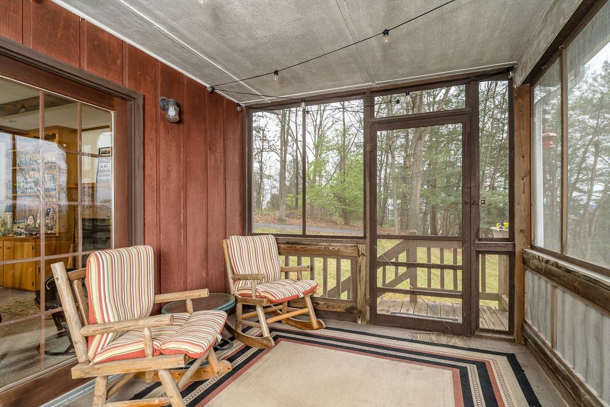 188 New Market Reservoir Road New Market, VA 22844 - Photo 23 of 61 Charming screened porch with nature views.