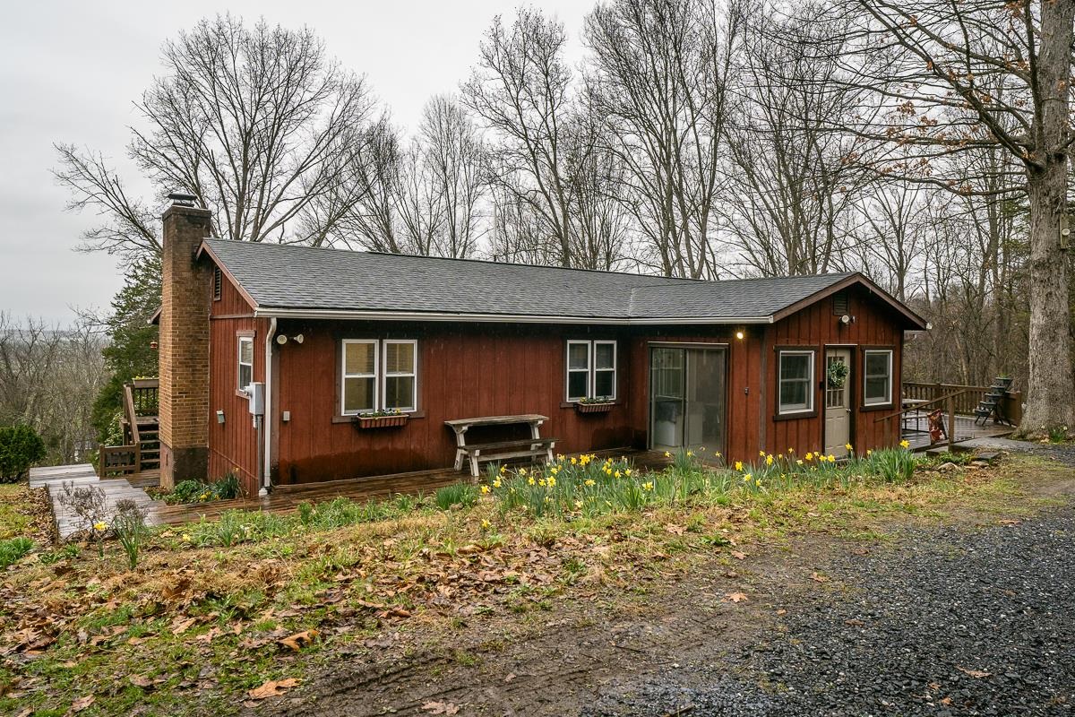 188 New Market Reservoir Road New Market, VA 22844 - Photo 26 of 61 a front view of a house with garden