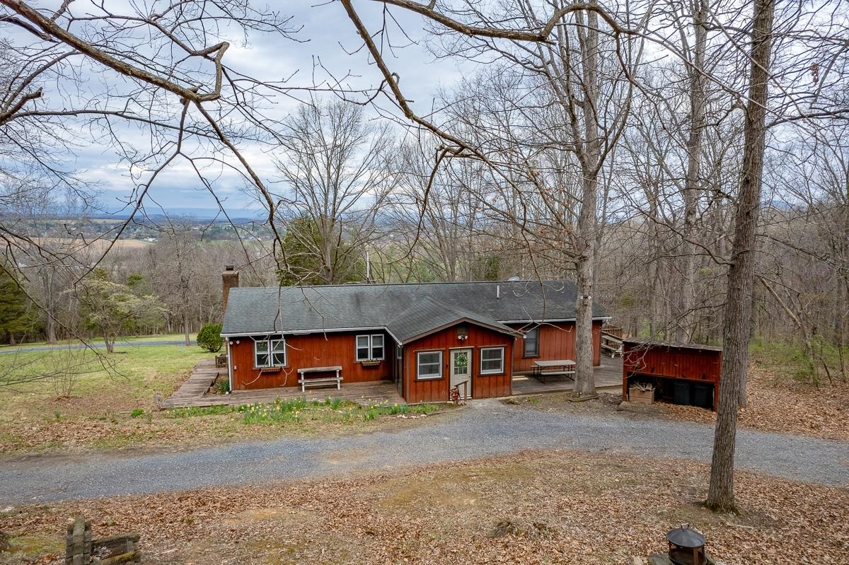 188 New Market Reservoir Road New Market, VA 22844 - Photo 36 of 61 a view of a house with a yard and sitting area