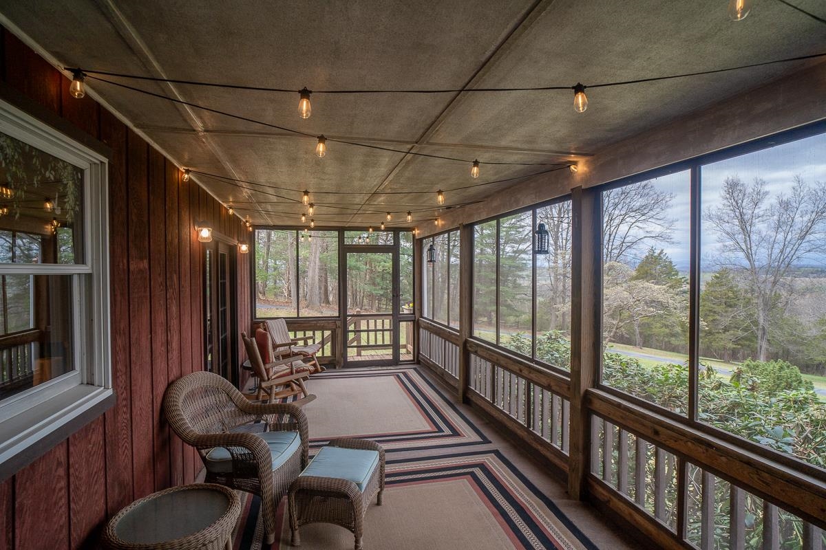 188 New Market Reservoir Road New Market, VA 22844 - Photo 45 of 61 a view of a room with furniture wooden floor and windows