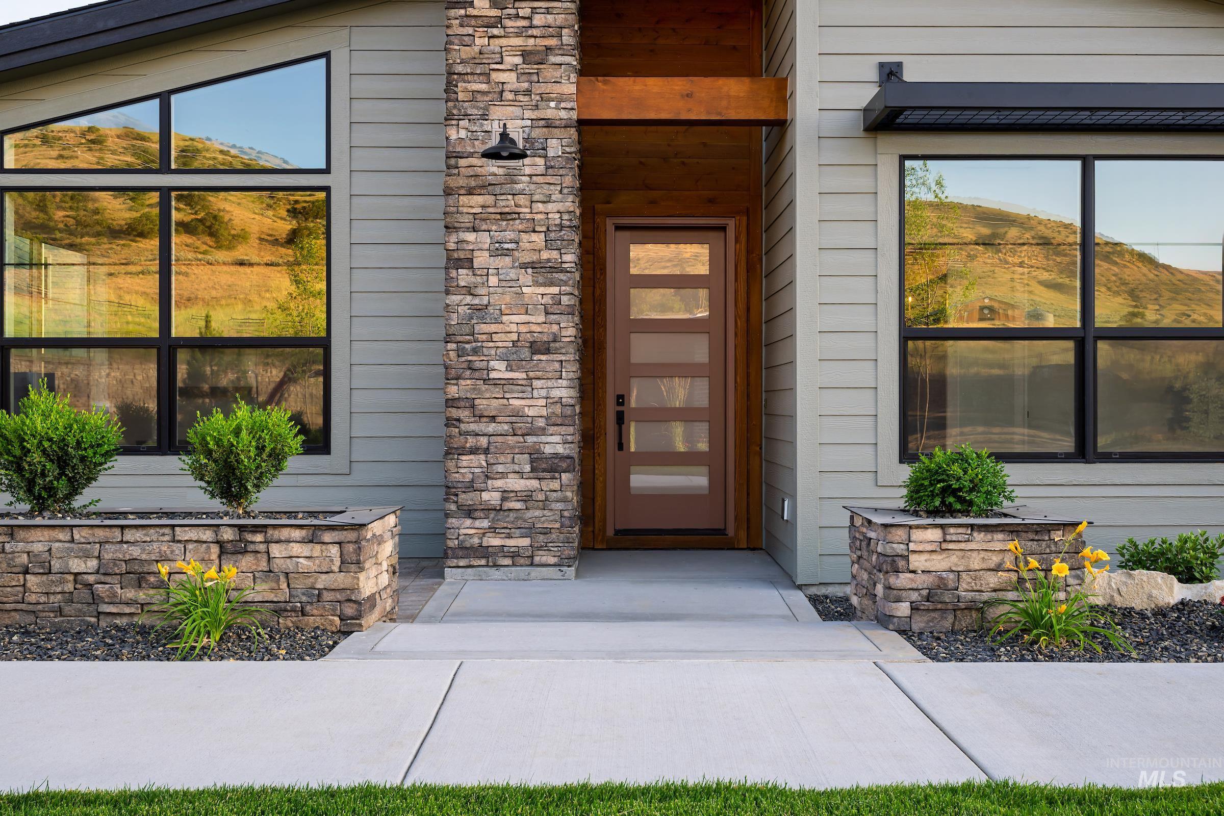 11733 North Rabbitbrush Way Boise, ID 83714 - Photo 2 of 31 Entrance to property with a mountain view