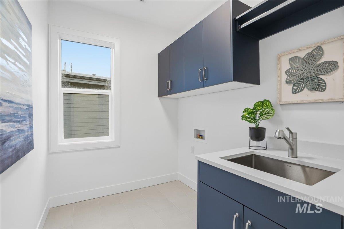 11733 North Rabbitbrush Way Boise, ID 83714 - Photo 26 of 31 Laundry area featuring cabinet space and hookup for a washing machine