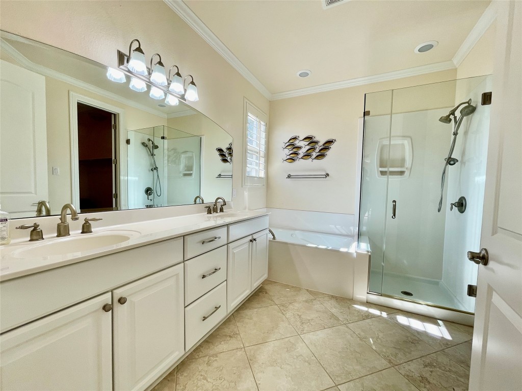 20603 Highland Lake Loop Lago Vista, TX 78645 - Photo 14 of 37 a spacious bathroom with a shower sink mirror and