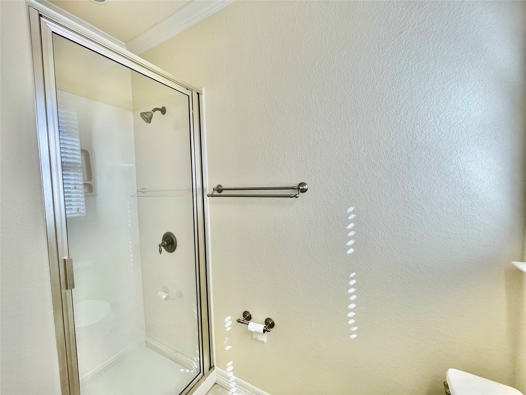20603 Highland Lake Loop Lago Vista, TX 78645 - Photo 35 of 37 a bathroom with a shower