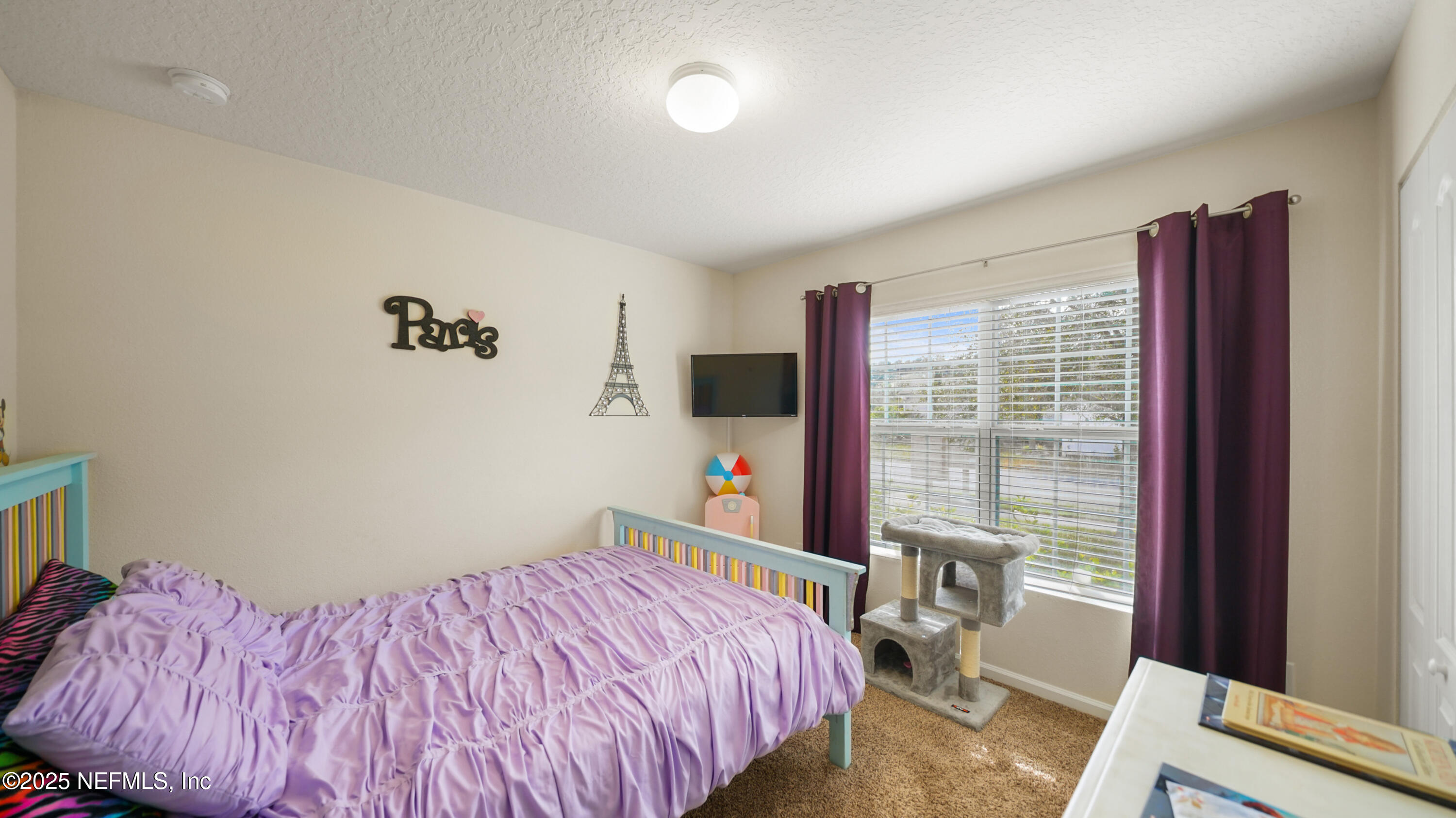 75 Pullman Circle St. Augustine, FL 32084 - Photo 15 of 25 a bedroom with a bed and a window