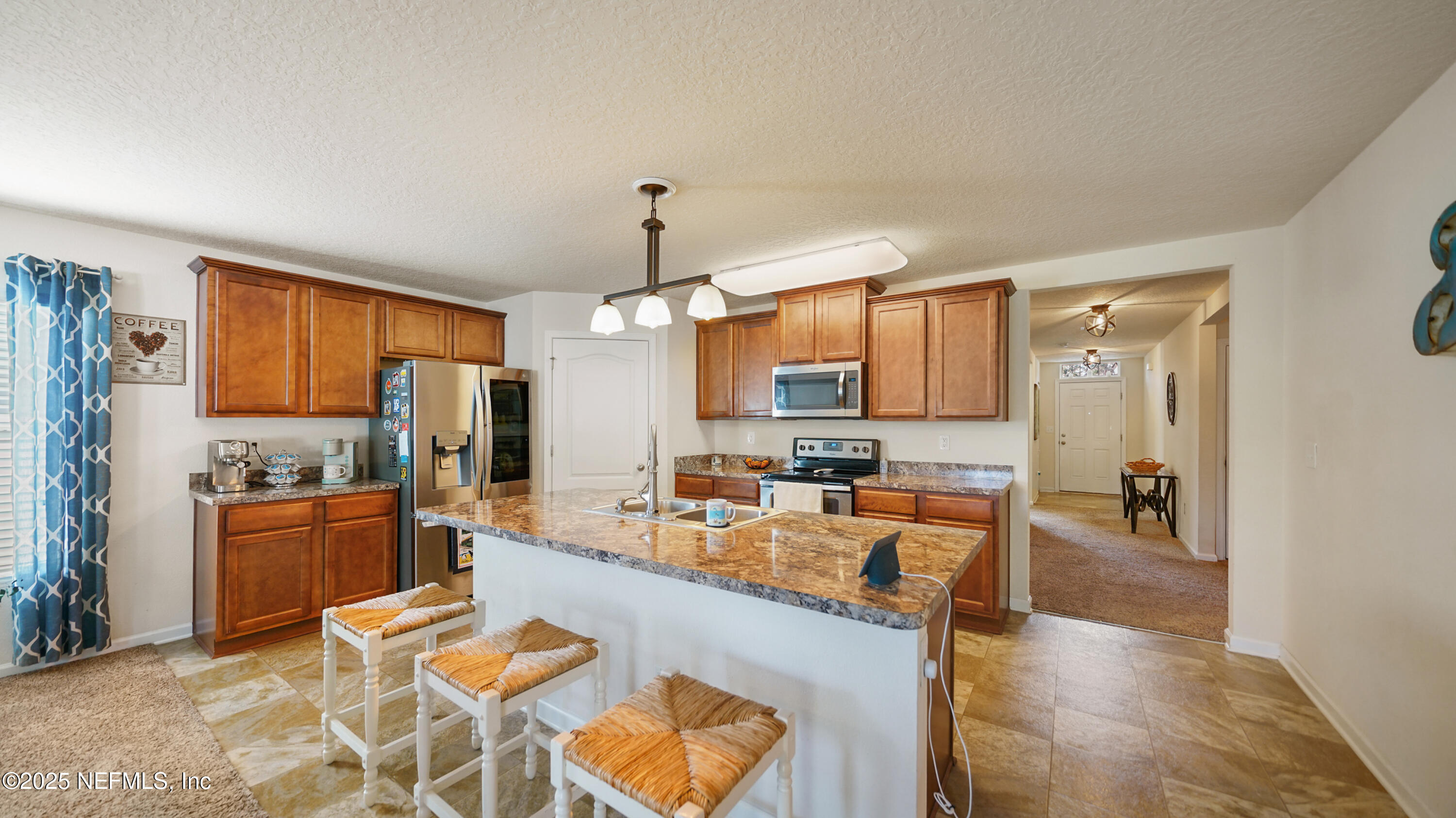 75 Pullman Circle St. Augustine, FL 32084 - Photo 2 of 25 a large kitchen with a table and chairs