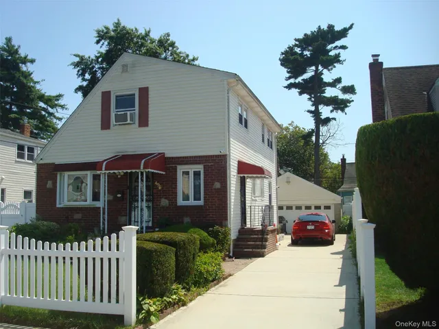 a front view of a house with a porch