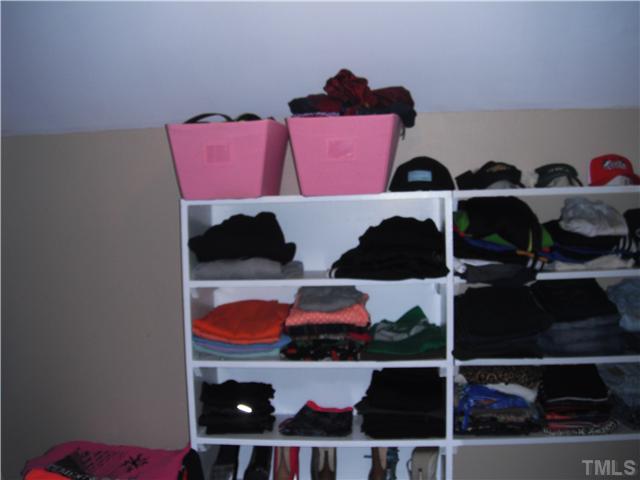 800 Ivanhoe Drive Raleigh, NC 27615 - Photo 15 of 19 a room with lots of different colored cloths
