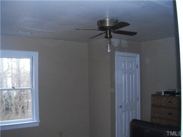 800 Ivanhoe Drive Raleigh, NC 27615 - Photo 18 of 19 a view of a hallway with a window
