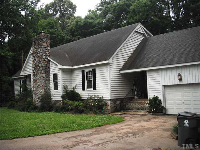 800 Ivanhoe Drive Raleigh, NC 27615 - Photo 2 of 19 a view of a house with a yard