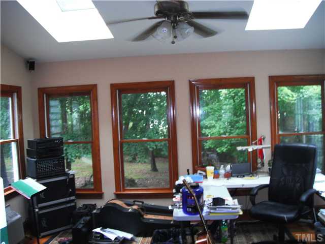 800 Ivanhoe Drive Raleigh, NC 27615 - Photo 7 of 19 a living room with furniture and a window