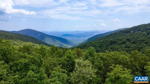 a view of a lush green mountain