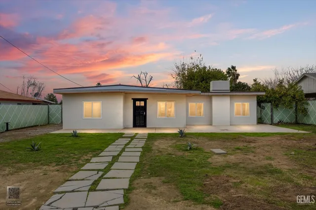 a house view with a garden space